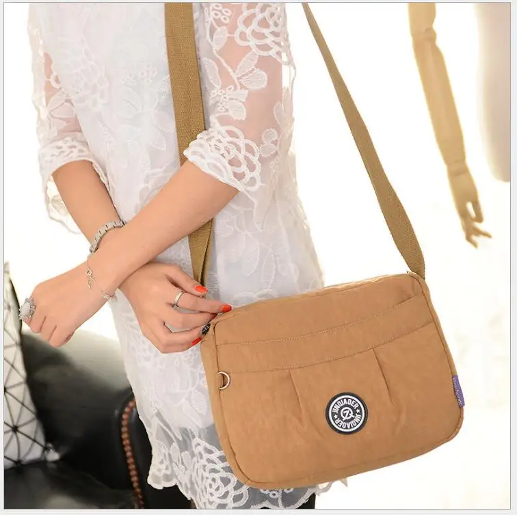 JIN QIAO ER brand women waterproof nylon Handbag lady Messenger bag mini bag fashion ladies shoulder bag
JIN QIAO ER brand women waterproof nylon Handbag lady Messenger bag mini bag fashion ladies shoulder bag