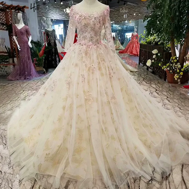 Vintage Long Sleeves Sexy 2019 Wedding Dresses Romantic Flowers Sequined Luxury Bridal Wedding Gown Real Photo
Vintage Long Sleeves Sexy 2019 Wedding Dresses Romantic Flowers Sequined Luxury Bridal Wedding Gown Real Photo