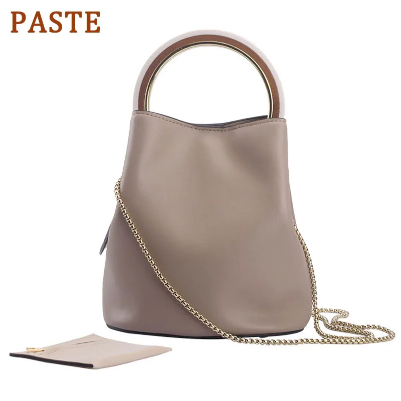 PASTE Luxury Bucket Women Genuine Leather Handbags Chain Female Shoulder Messenger Bags Acrylic Ring Handle Purse Summer 2019 
PASTE Luxury Bucket Women Genuine Leather Handbags Chain Female Shoulder Messenger Bags Acrylic Ring Handle Purse Summer 2019