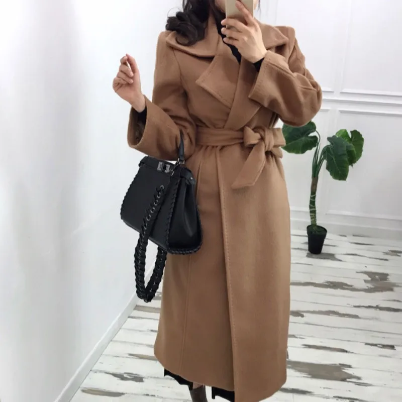 Autumn and winter thickening belt fashion temperament woolen coat female coat long paragraph over the knee A064
Autumn and winter thickening belt fashion temperament woolen coat female coat long paragraph over the knee A064