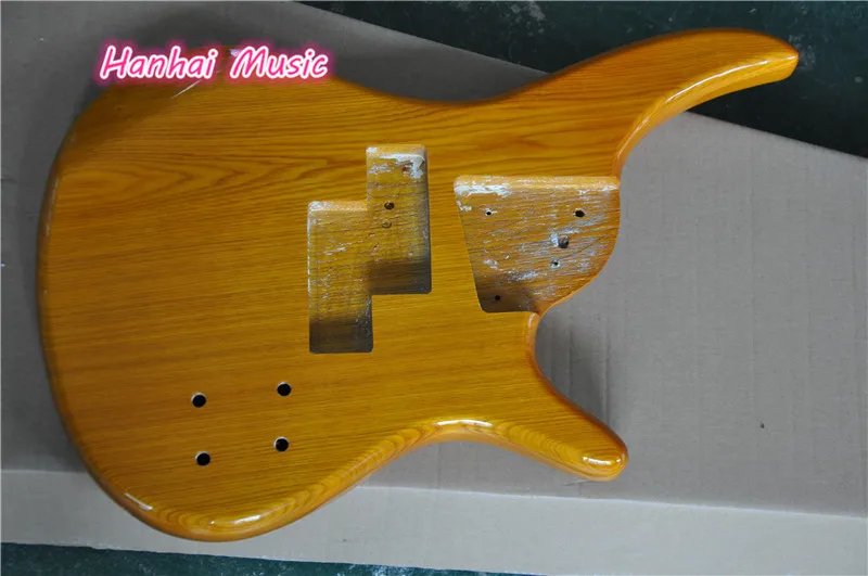 Gorgeous Electric Bass Body made of Ash wood and we can custom different kinds of guitar and bass necks,body
Gorgeous Electric Bass Body made of Ash wood and we can custom different kinds of guitar and bass necks,body