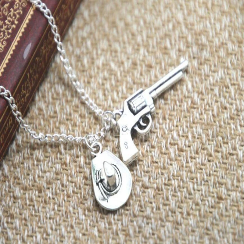 Walking Dead Charm Pendant Necklace Gun Bullet Cowboy Hat Pendant long necklace Carl Grimes Charm inspired Neckace
Walking Dead Charm Pendant Necklace Gun Bullet Cowboy Hat Pendant long necklace Carl Grimes Charm inspired Neckace