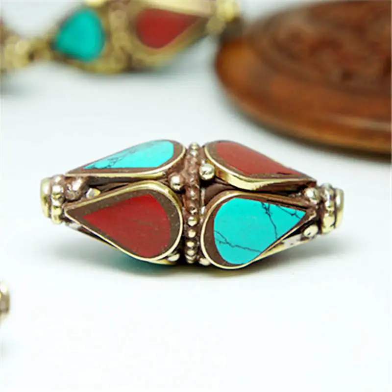 Nepal Hand Metal Beads Brass Inlay Colorful Stone Big Shuttle Bullet Loose Beads for DIY NBB357
Nepal Hand Metal Beads Brass Inlay Colorful Stone Big Shuttle Bullet Loose Beads for DIY NBB357