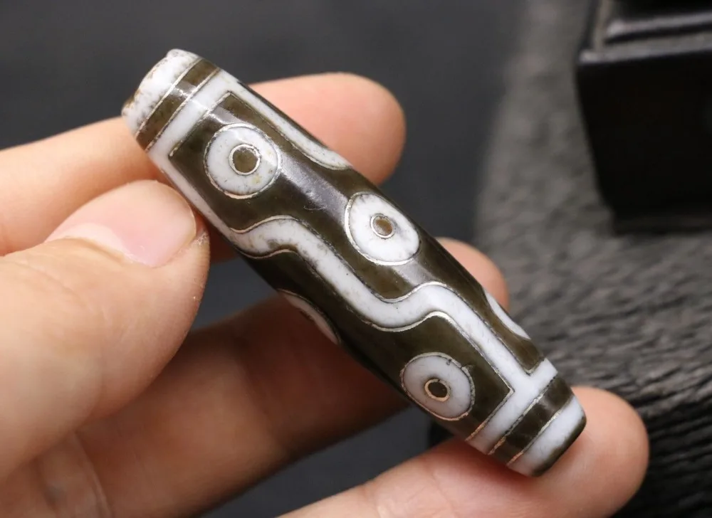 Treasure Magic LKbrother Energy Magic Tibetan Old Oily Agate Silver Inlay 9 eye Kingdom Totem dZi Bead 59mm
Treasure Magic LKbrother Energy Magic Tibetan Old Oily Agate Silver Inlay 9 eye Kingdom Totem dZi Bead 59mm