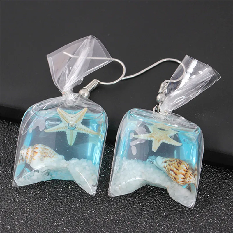 Ocean Conch Trendy Dangle Hook Earrings Dried Flowers Water Bag Drop Earring Brincos Bijoux Charming Jewelry For Women
Ocean Conch Trendy Dangle Hook Earrings Dried Flowers Water Bag Drop Earring Brincos Bijoux Charming Jewelry For Women