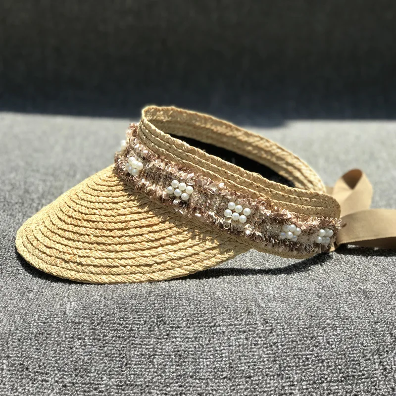 01905-xintao new summer handmade raffia pearl bowknot without straw lady visors cap women leisure hat
01905-xintao new summer handmade raffia pearl bowknot without straw lady visors cap women leisure hat