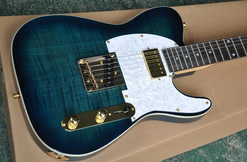 Blue body Electric Guitar with Rosewood fingerboard,White pearl Pickguard,Gold hardwares free shipping
Blue body Electric Guitar with Rosewood fingerboard,White pearl Pickguard,Gold hardwares free shipping