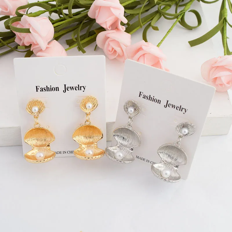 MESTILO 2019 Simple Fashion Jewelry Simulated Pearls Earrings Gold Silver Color Open Sea Shell Earrings For Girls Party Jewelry
MESTILO 2019 Simple Fashion Jewelry Simulated Pearls Earrings Gold Silver Color Open Sea Shell Earrings For Girls Party Jewelry