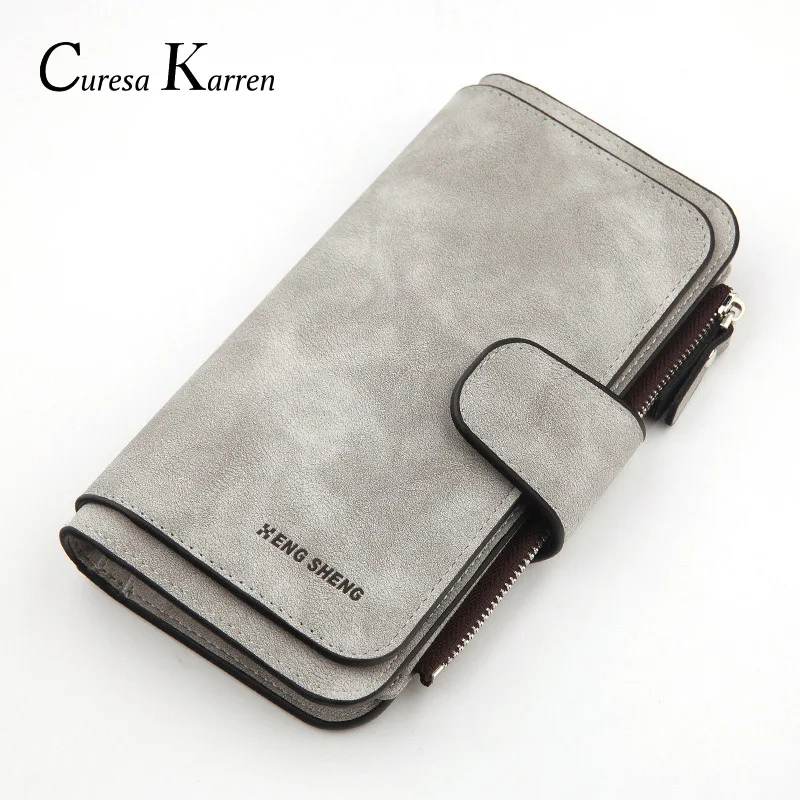 New hot sale unisex long coin purse casual, solid color, simple, stylish zipper buckle design long wallet Free shipping 
New hot sale unisex long coin purse casual, solid color, simple, stylish zipper buckle design long wallet Free shipping