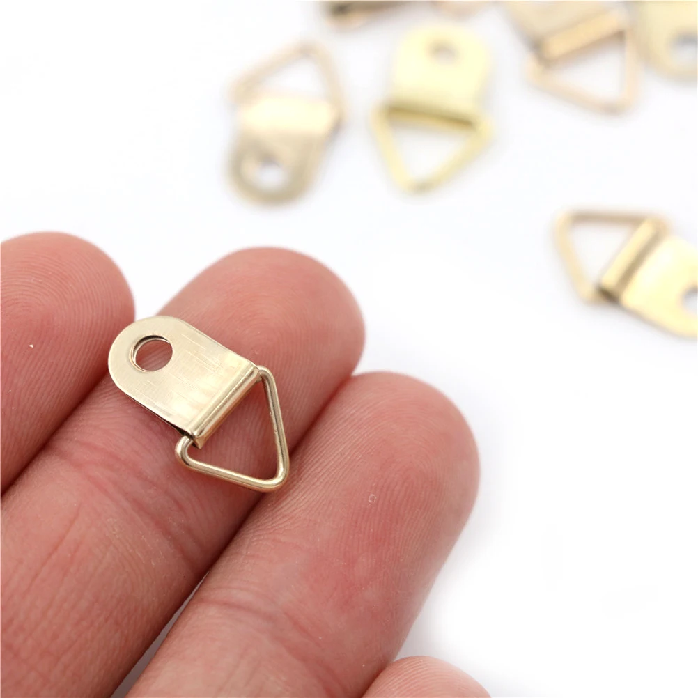 100PCS/pack Golden Triangle D-Rings Hanging Picture Oil Painting Mirror Frame Hooks Picture Frame Hanger High Quality
100PCS/pack Golden Triangle D-Rings Hanging Picture Oil Painting Mirror Frame Hooks Picture Frame Hanger High Quality