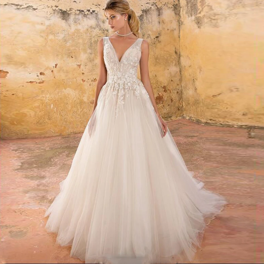 Dreaming Beading Applique Soft Tulle A-line Wedding Dress with V-neck Backless Flowers Lace Court Train Long Bridal Dress
Dreaming Beading Applique Soft Tulle A-line Wedding Dress with V-neck Backless Flowers Lace Court Train Long Bridal Dress