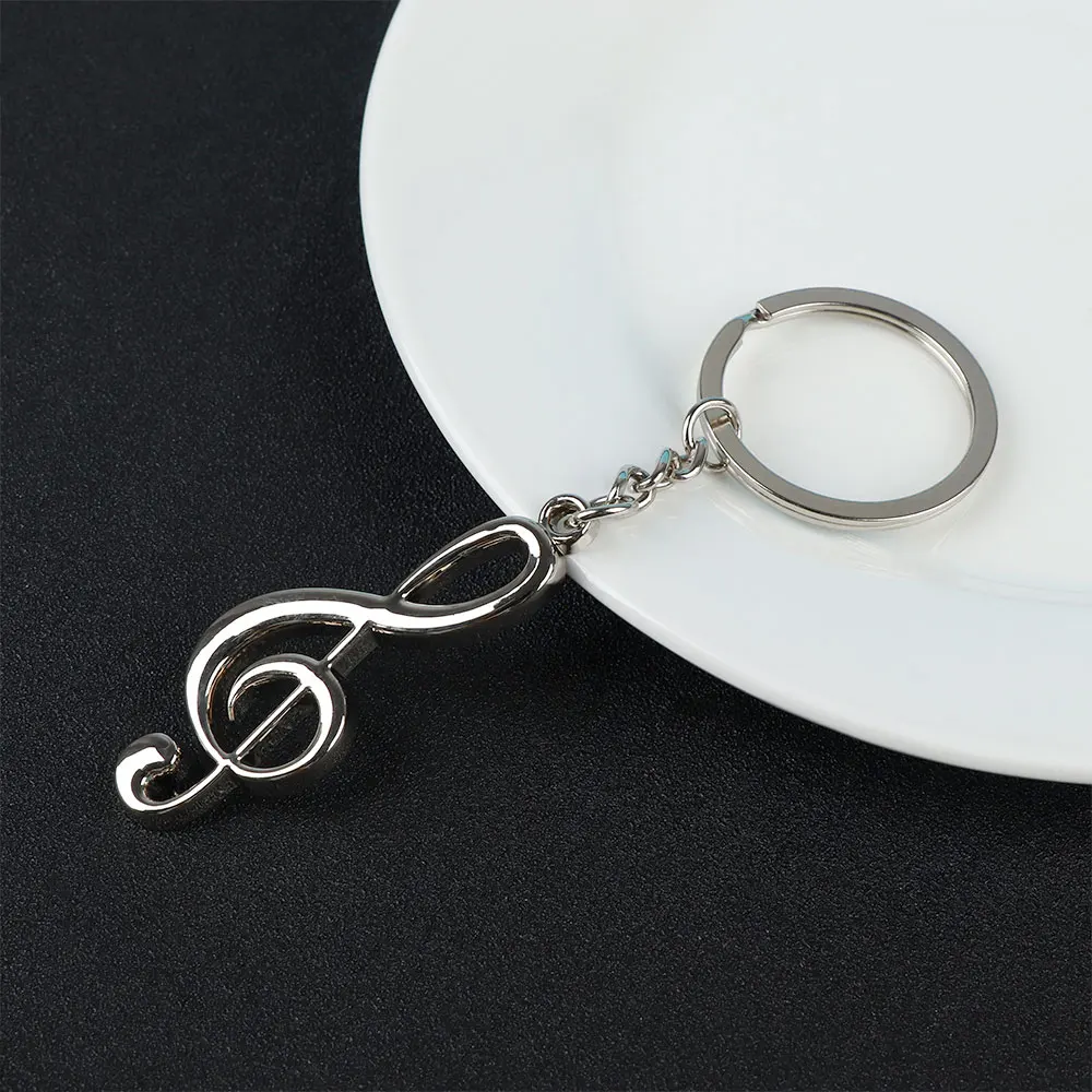 Creative Metal Musical Note Key Chain Novelty Souvenir Keychain Key Ring Special Music Students Graduation Gifts
Creative Metal Musical Note Key Chain Novelty Souvenir Keychain Key Ring Special Music Students Graduation Gifts