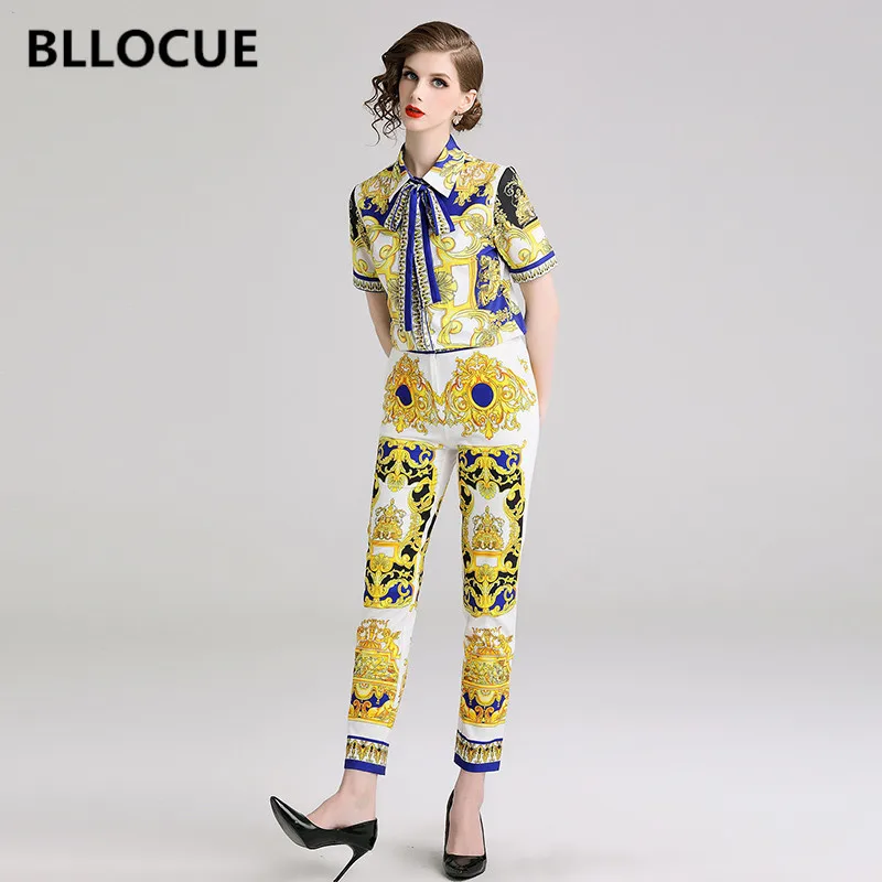 Женский костюм с бантом BLLOCUE, топ с коротким рукавом и винтажный принт + брюки, подиумный костюм, 2021
Женский костюм с бантом BLLOCUE, топ с коротким рукавом и винтажный принт + брюки, подиумный костюм, 2021