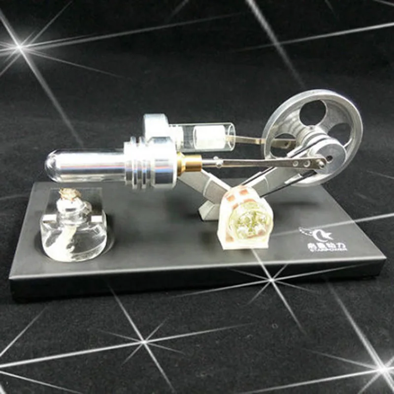 Sterling engine model Sterling generator metal base plate science and education toy.
Sterling engine model Sterling generator metal base plate science and education toy.