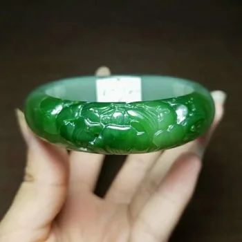 H61#Russian material and Tian Yubing bottom white plus green jasper carved bracelet
H61#Russian material and Tian Yubing bottom white plus green jasper carved bracelet