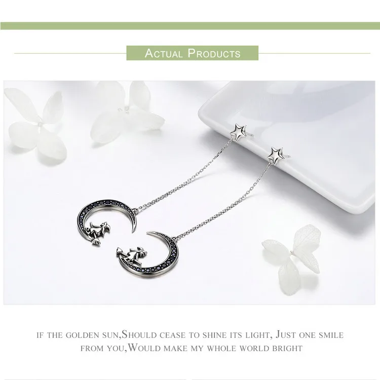 Moon Witch Dangle Earrings 11 Moon Witch Dangle Earrings - Inspired by the magic witch in the fairy tales, the ornament is very cute and delicate. The Moon Witch Dangle Earrings feature ear buckets in the shape of stars with long chains that link to exquisite crescent moon elements with little witches on them. The long earrings design modifies the contour of the face. Perfect gift for Halloween and witch lovers. | 🚚 Free Standard Shipping 7-30 days | 🥇 Top Quality Product | 💎 100% S925 Sterling Silver | 🛡️ 100% Safe & Secure checkout