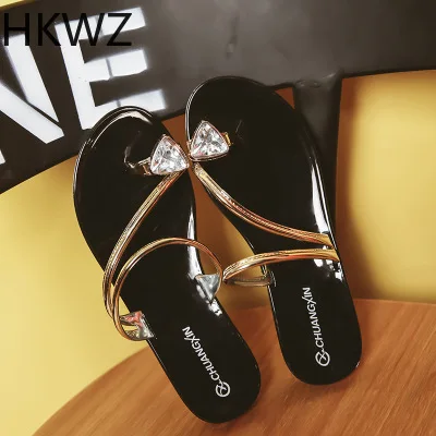 Summer brand new rhinestone toe Bling low-heeled word slip non-slip beach sandals hollow breathable fashion Roman sandals H0214
Summer brand new rhinestone toe Bling low-heeled word slip non-slip beach sandals hollow breathable fashion Roman sandals H0214