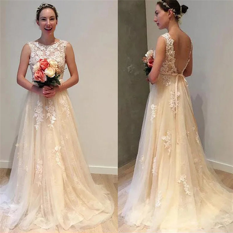 Champagne Boho Wedding Dresses 2019 Tulle Lace Appliques Scoop Neck Bride Dress Backless Wedding Gown Vestidos de Noiva
Champagne Boho Wedding Dresses 2019 Tulle Lace Appliques Scoop Neck Bride Dress Backless Wedding Gown Vestidos de Noiva
