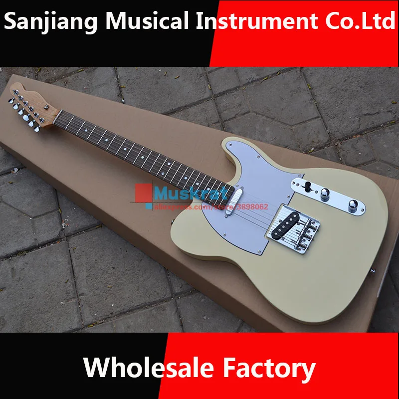 Electric guitar TL Free shipping Milk color 6 strings guitar give as a present Backpack dial the slice
Electric guitar TL Free shipping Milk color 6 strings guitar give as a present Backpack dial the slice