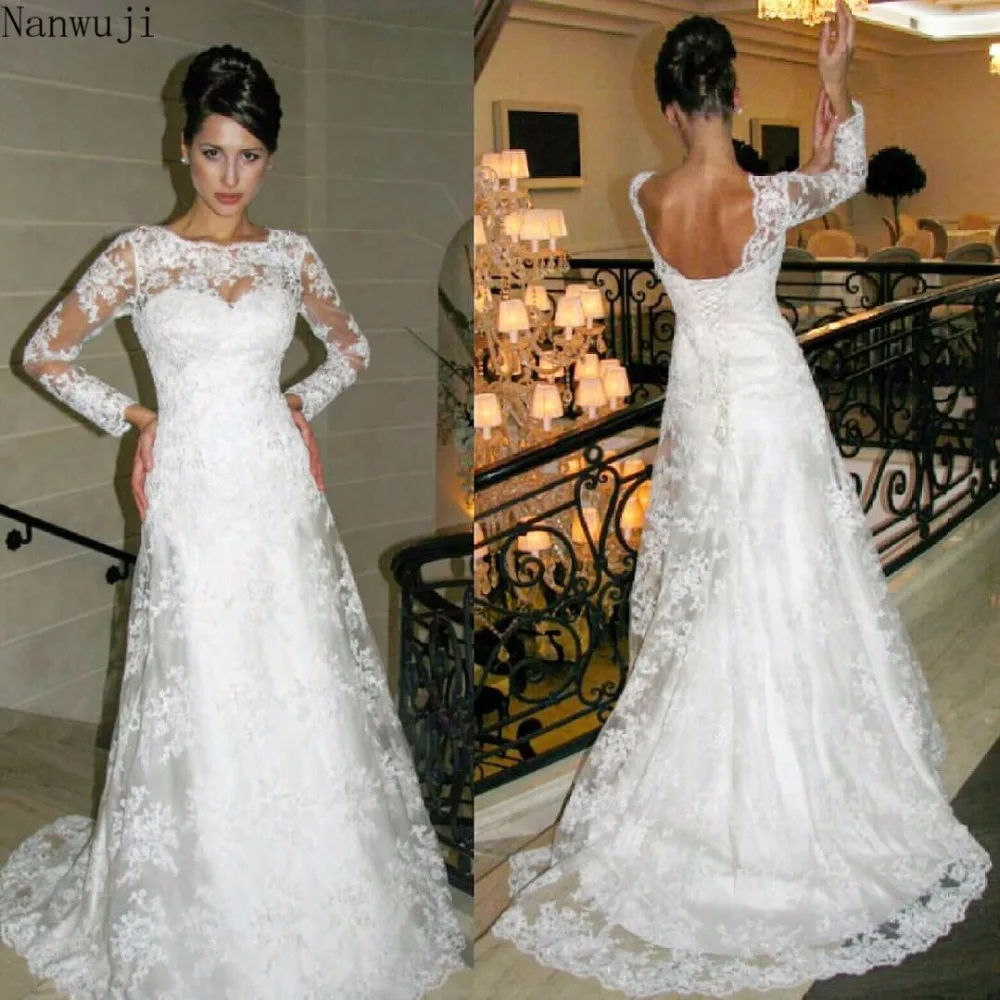 Beach Wedding Dress With Long Sleeve Illusion High Neckline Lace Appliques Flowy Tulle Summer Dresses Bridal Gowns With Buttons
Beach Wedding Dress With Long Sleeve Illusion High Neckline Lace Appliques Flowy Tulle Summer Dresses Bridal Gowns With Buttons