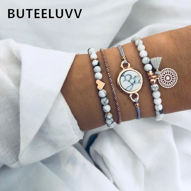 BUTEELUVV Gray White Stone Beaded Bracelets Set for Women Bohemian Fashion Gray Tassel Carved Flower Round Heart Charm Bracelets
BUTEELUVV Gray White Stone Beaded Bracelets Set for Women Bohemian Fashion Gray Tassel Carved Flower Round Heart Charm Bracelets