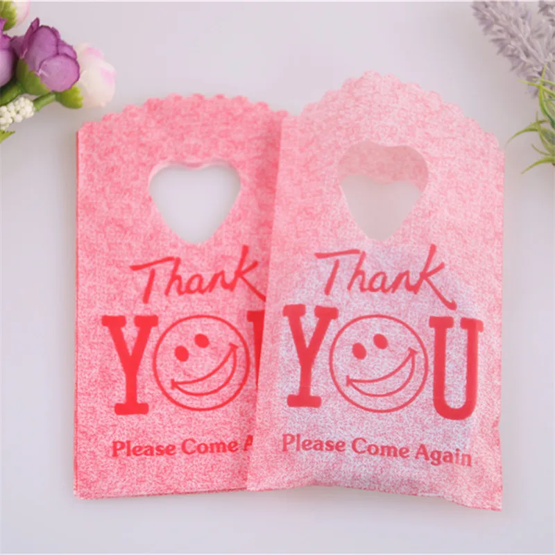 Fashion Style Wholesale 50pcs/lot 9*15cm Red Mini Thank You Packaging with Smile Face Small Plastic Bags For Birthday
Fashion Style Wholesale 50pcs/lot 9*15cm Red Mini Thank You Packaging with Smile Face Small Plastic Bags For Birthday