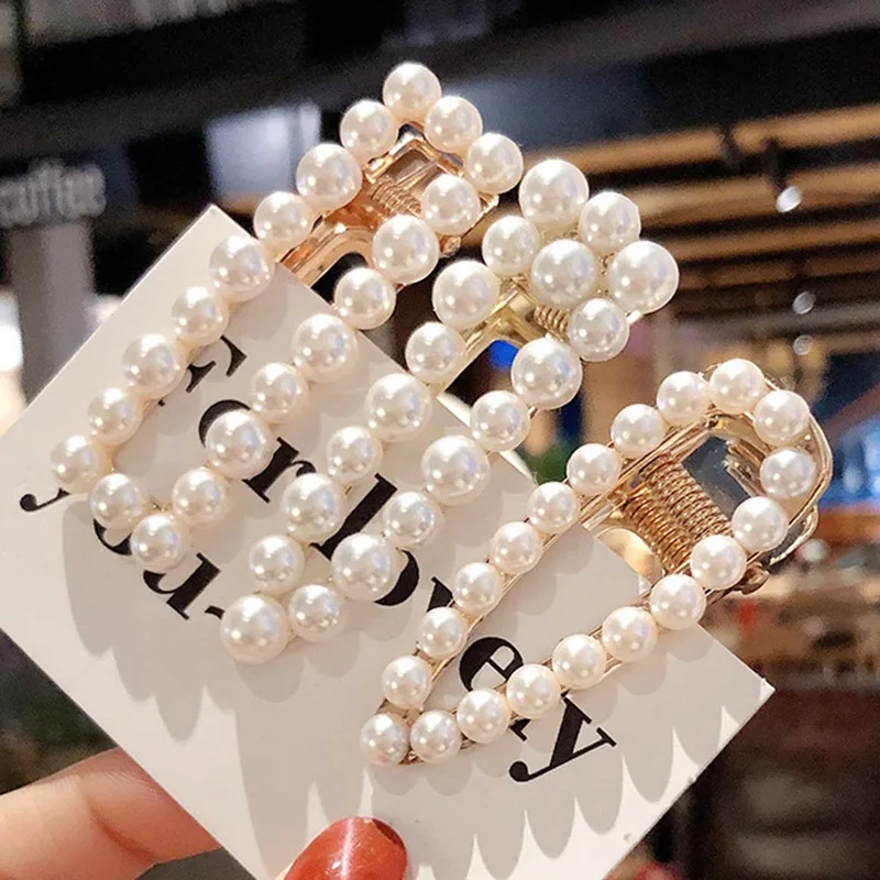 2019 New Fashion Hollow Design Sense Card Duckbill Clip Trend Personality Liu Seaside Clip Imitation Pearl Hairpin
2019 New Fashion Hollow Design Sense Card Duckbill Clip Trend Personality Liu Seaside Clip Imitation Pearl Hairpin