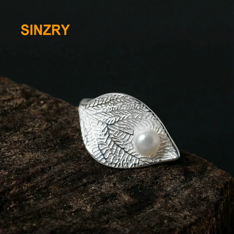 Sinzry 100% 925 Sterling Silver Creative immitation pearl adjustable rings Gracious Female leaf ring Fine Jewelry
Sinzry 100% 925 Sterling Silver Creative immitation pearl adjustable rings Gracious Female leaf ring Fine Jewelry