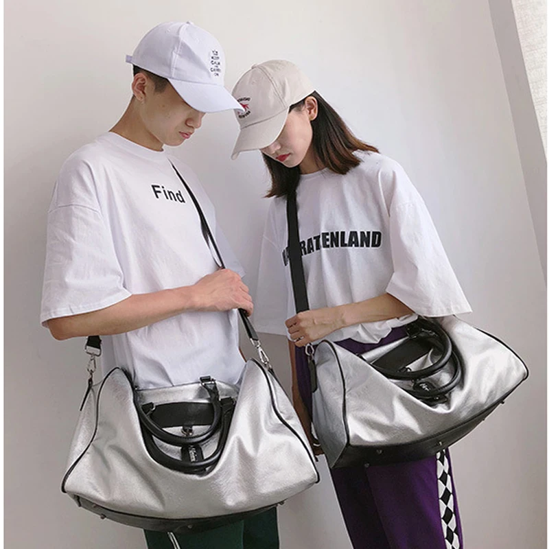 Large capacity ladies men's handbag travel fitness bag fashion PU silver leather Messenger bag personalized portable travel bag
Large capacity ladies men's handbag travel fitness bag fashion PU silver leather Messenger bag personalized portable travel bag