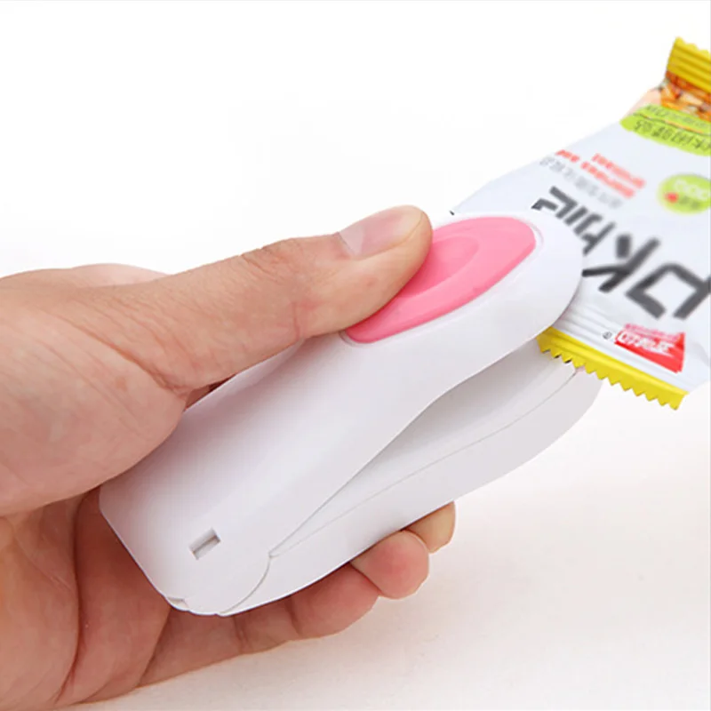 Household mini snacks plastic bag sealer machine The portable travel hand pressure type hot sealing machine kitchen accessories
Household mini snacks plastic bag sealer machine The portable travel hand pressure type hot sealing machine kitchen accessories