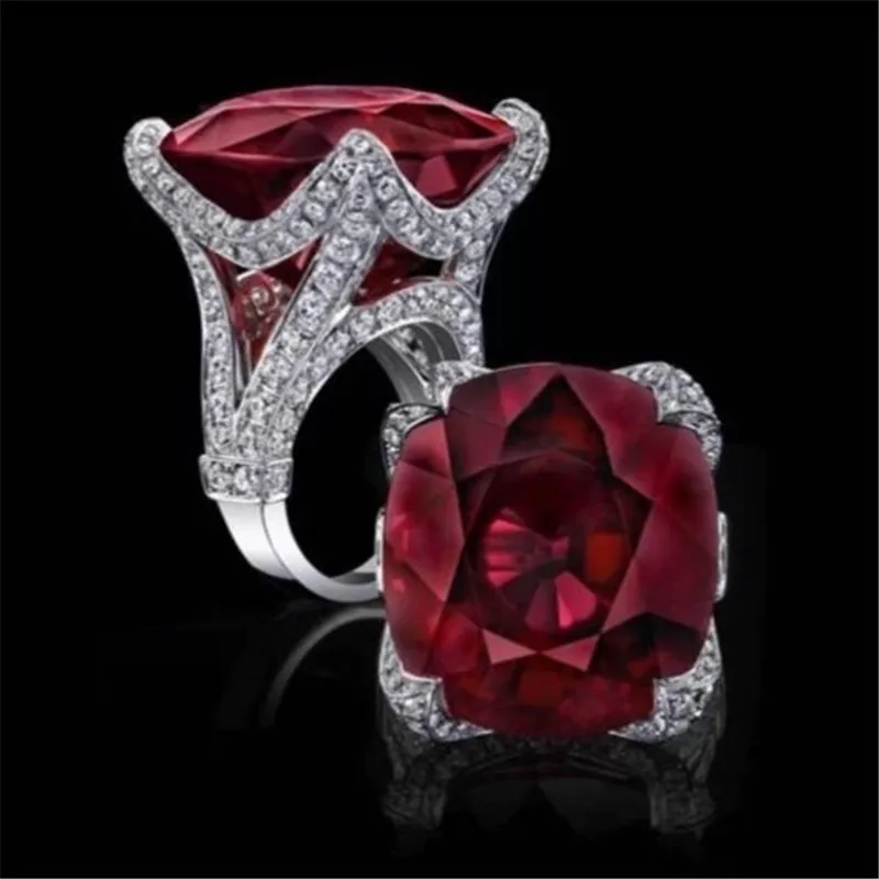 Luxury Large Red Stone Bright Silver Hollow Out Crystal Around Rings for Women Girl Anniversary Dating Romantic Anillos O2C231
Luxury Large Red Stone Bright Silver Hollow Out Crystal Around Rings for Women Girl Anniversary Dating Romantic Anillos O2C231