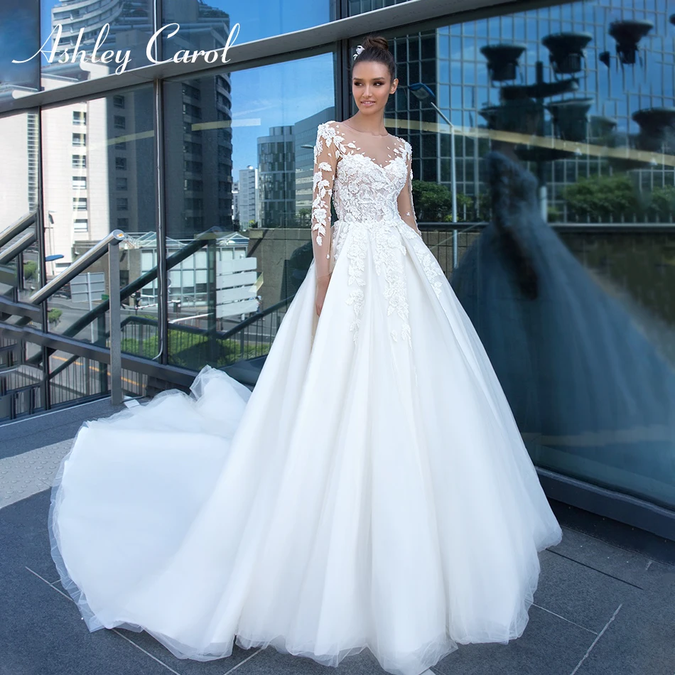 Ashley Carol Fashion Scoop Long Sleeve Lace Princess Illusion Back Wedding Dress 2019 New Court Train Bride Dress Wedding Gowns
Ashley Carol Fashion Scoop Long Sleeve Lace Princess Illusion Back Wedding Dress 2019 New Court Train Bride Dress Wedding Gowns