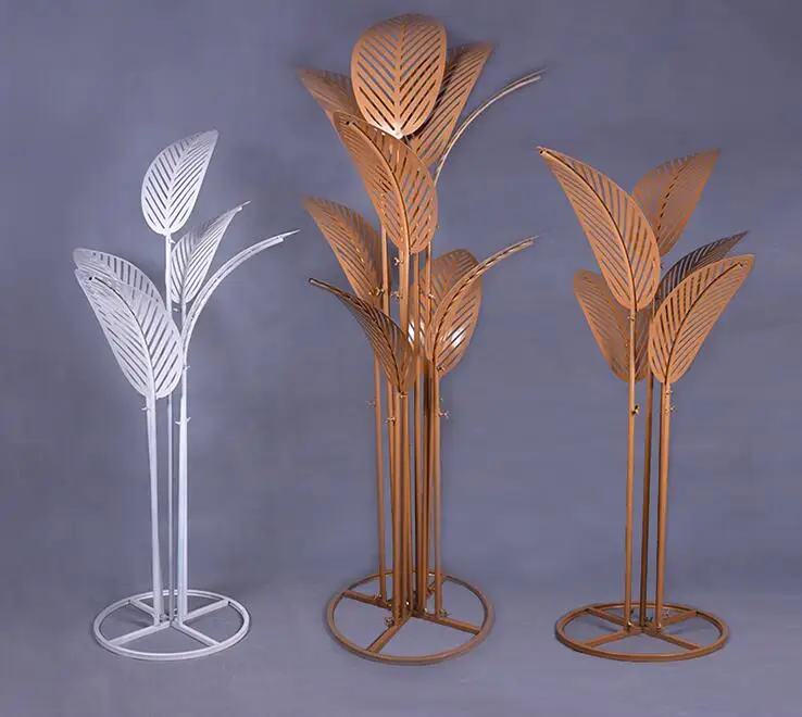 Wedding props new banana tree road simulation iron leaf of Japanese banana wedding arrangemnet scene decoration stage ornaments.
Wedding props new banana tree road simulation iron leaf of Japanese banana wedding arrangemnet scene decoration stage ornaments.