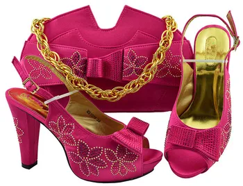 Charming fuchsia high heel African shoes and handbag set with rhinestones for wedding/party MM1078
Charming fuchsia high heel African shoes and handbag set with rhinestones for wedding/party MM1078