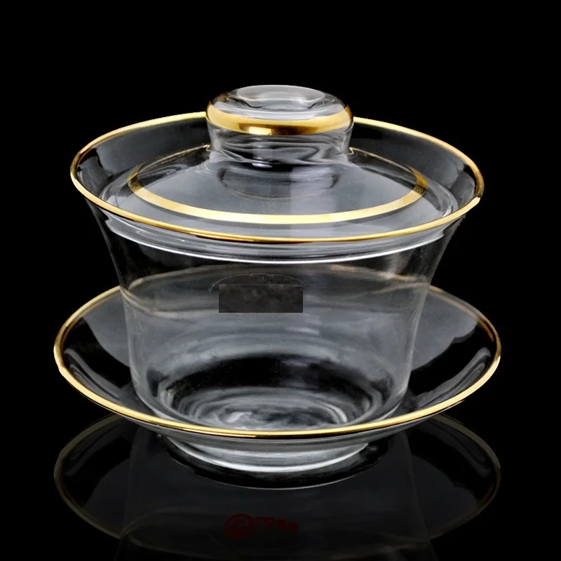 Heat resistant and heat resistant, transparent glass cover bowl kung fu tea ceremony tea set three cups of tea cups and tea cu
Heat resistant and heat resistant, transparent glass cover bowl kung fu tea ceremony tea set three cups of tea cups and tea cu