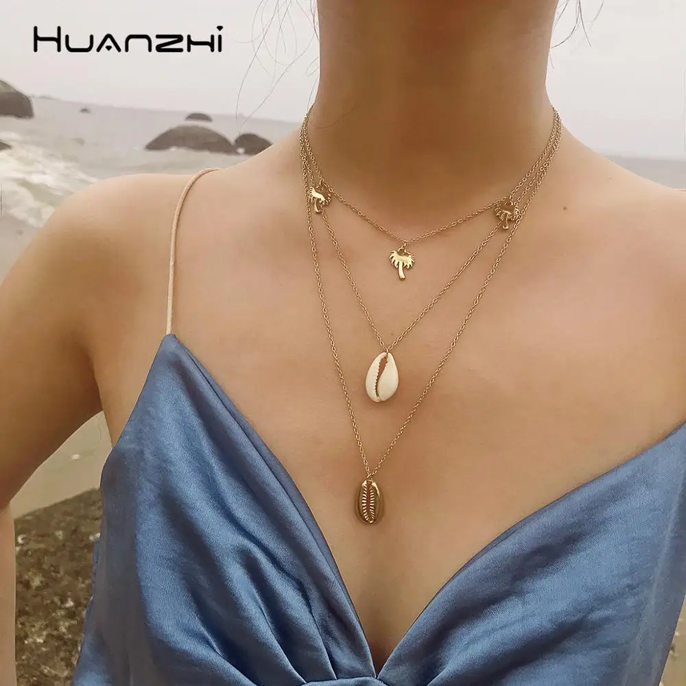 HUANZHI Bohemian Multilayer Coconut Tree Shell Choker Necklace Statement Alloy Shell Natural Seashell Pendant Necklace for Women
HUANZHI Bohemian Multilayer Coconut Tree Shell Choker Necklace Statement Alloy Shell Natural Seashell Pendant Necklace for Women