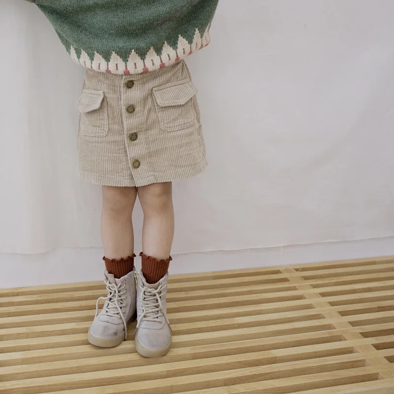 2019 Baby Girls Solid Corduroy Skirts Little Girls Mini Skirts Toddler Knee-Length Skirts Single-breasted Children Tutu Skirts
2019 Baby Girls Solid Corduroy Skirts Little Girls Mini Skirts Toddler Knee-Length Skirts Single-breasted Children Tutu Skirts