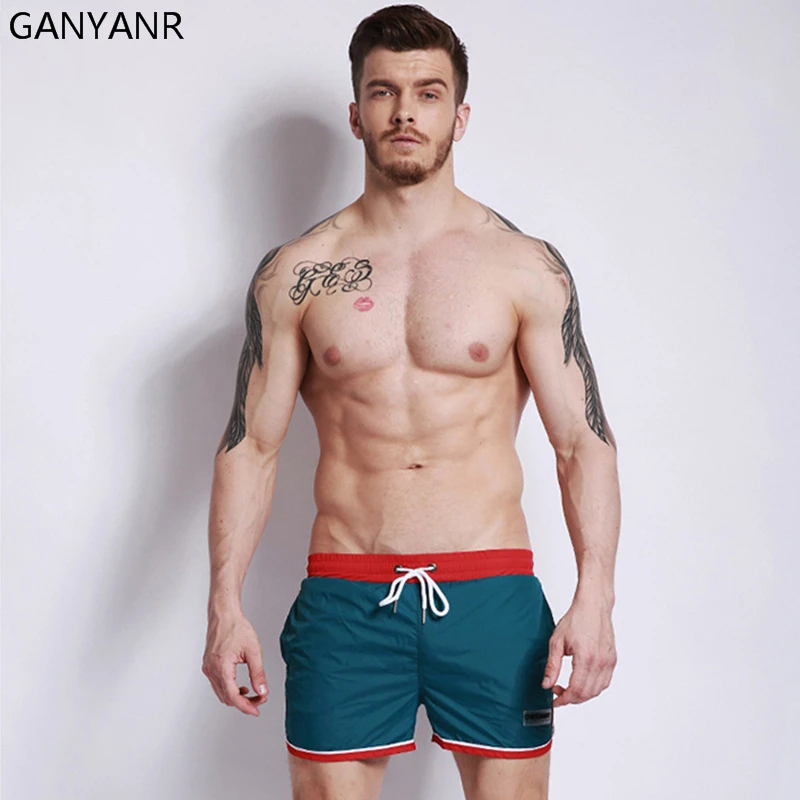 

GANYANR Brand Mens Swimming Shorts Boardshorts Swimwear Bermuda Surf Swimsuit For Surfing Beach Pants Gay Swim Trunks Sexy 2017