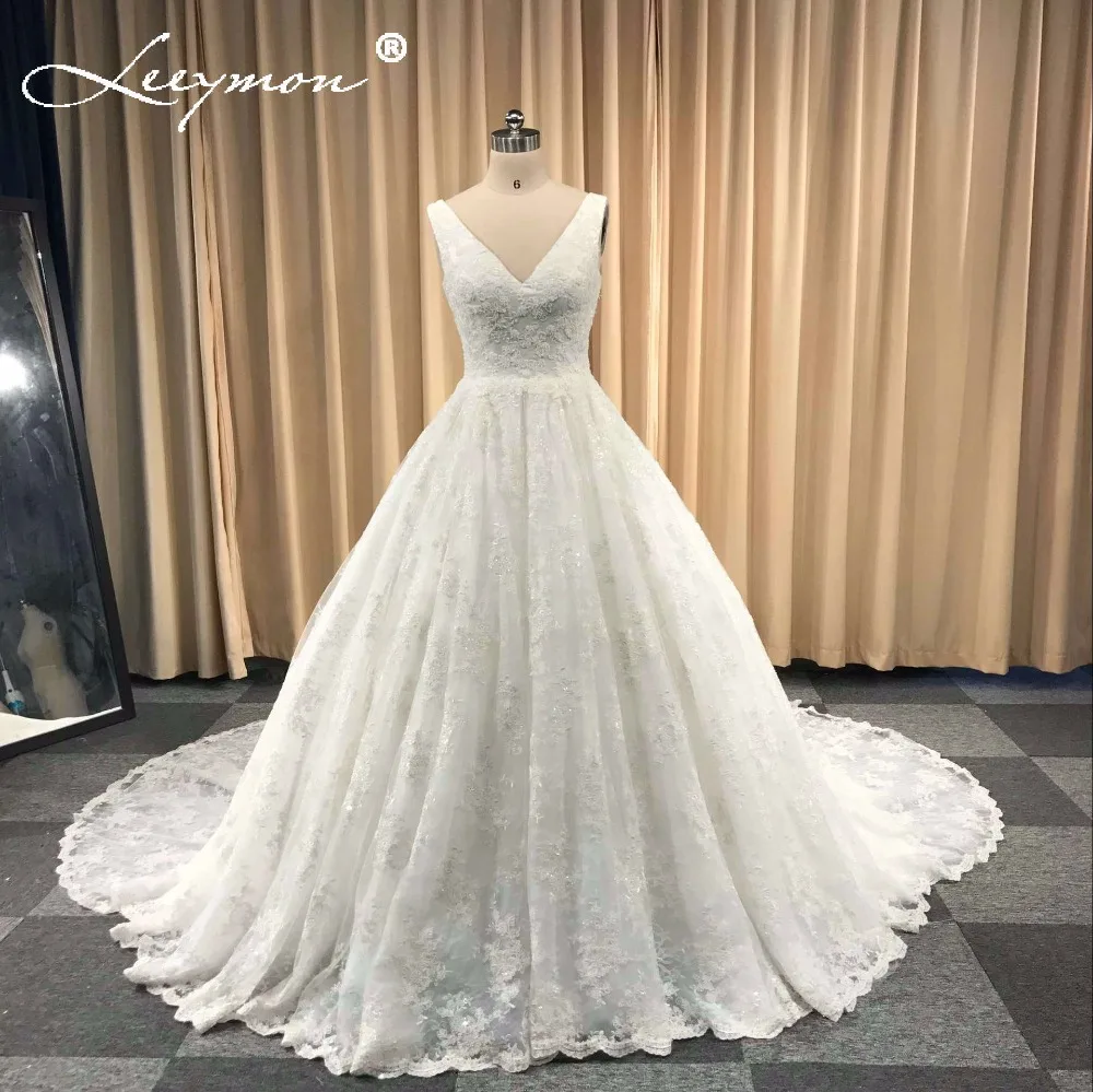 Sexy V neck Lace Wedding Dresses Beaded Sleeveless Vestidos De Novia Plus Size Custom Made Swep Train Bridal Gowns Open Back
Sexy V neck Lace Wedding Dresses Beaded Sleeveless Vestidos De Novia Plus Size Custom Made Swep Train Bridal Gowns Open Back