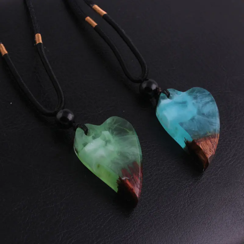 New high-end pendant necklace sweater chain blue and green solidification time resin handmade bag pendant G006
New high-end pendant necklace sweater chain blue and green solidification time resin handmade bag pendant G006