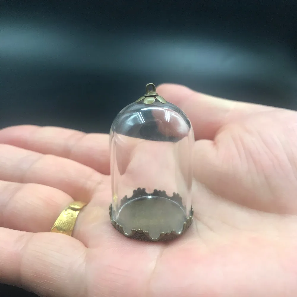 38x25mm Mini tube bell jars shape glass bubble bottle bronze flower tray cap DIY glass vials pendant necklace accessories decor
38x25mm Mini tube bell jars shape glass bubble bottle bronze flower tray cap DIY glass vials pendant necklace accessories decor
