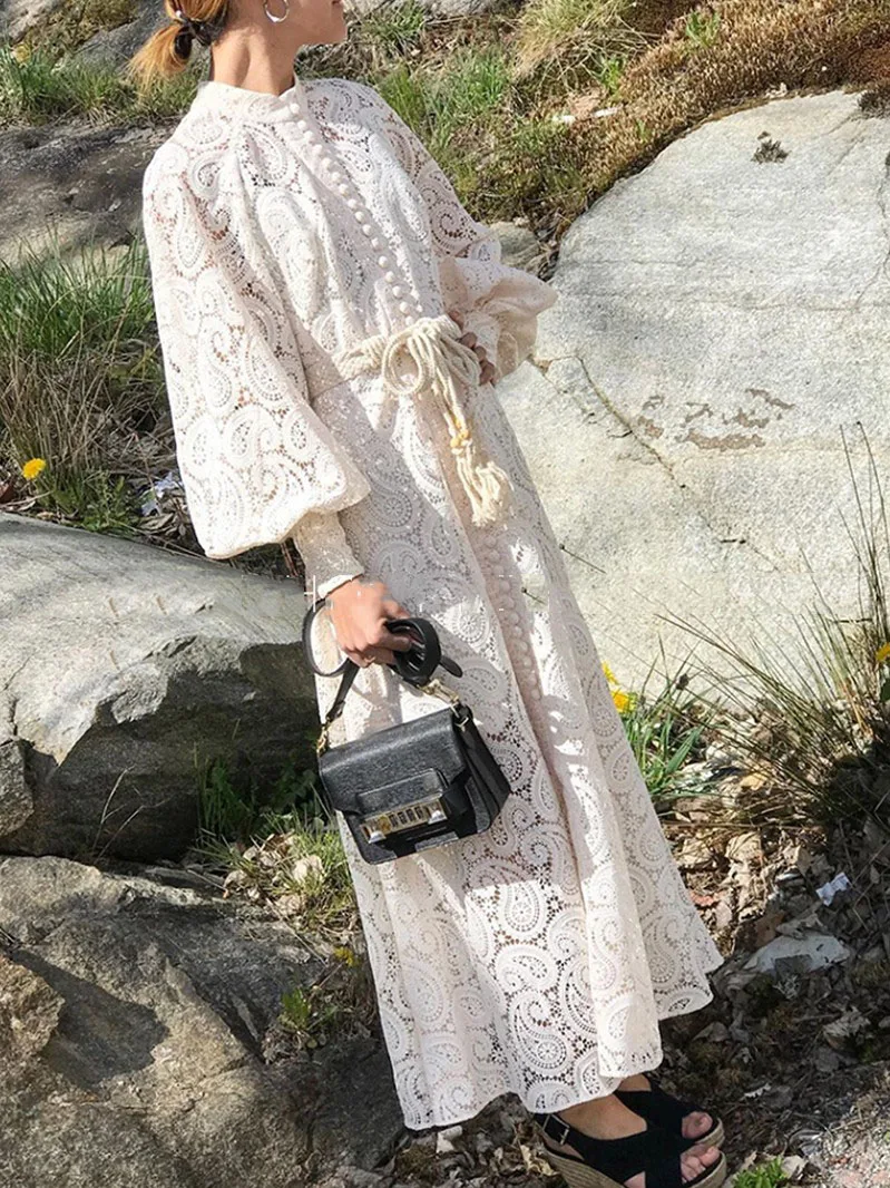 Woman Ivory AMARI PAISLEY LACE LONG DRESS Long blouson sleeves front buttoned macrame belt tied Mandarin high neckline
Woman Ivory AMARI PAISLEY LACE LONG DRESS Long blouson sleeves front buttoned macrame belt tied Mandarin high neckline