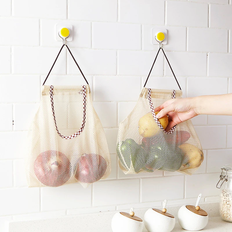 Hangable Kitchen Onion Garlic Storage Bag Multi-Function Fruit And Vegetable Sundries Wall Grid Storage Bag
Hangable Kitchen Onion Garlic Storage Bag Multi-Function Fruit And Vegetable Sundries Wall Grid Storage Bag