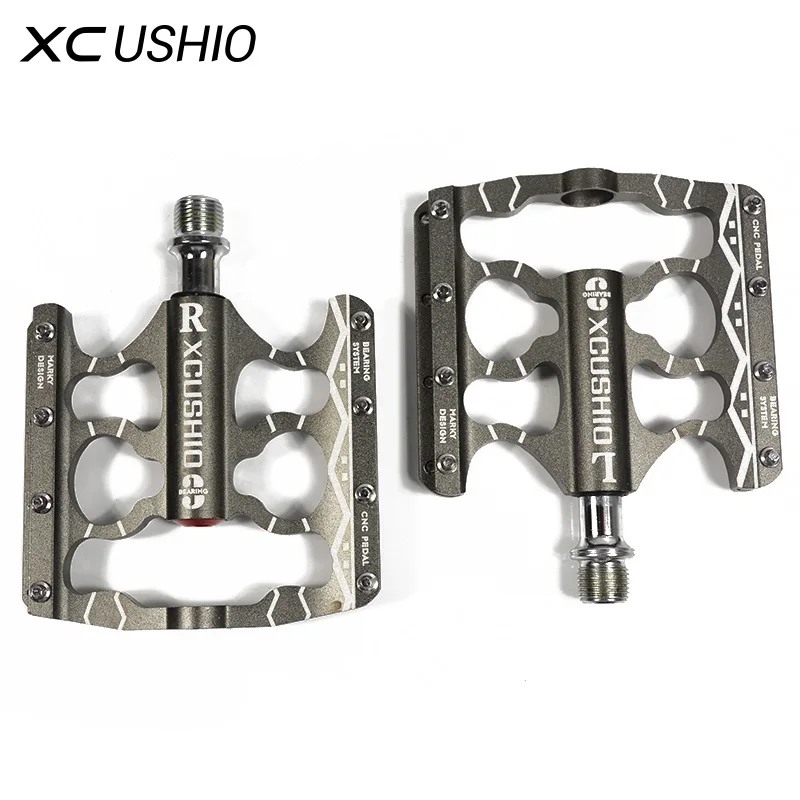 XC USHIO Bicycle Pedal Mountain Bike Sealed Bearing CNC Aluminum Alloy Cycling Pedals New Titanium Color for BMX Road Bike Parts
XC USHIO Bicycle Pedal Mountain Bike Sealed Bearing CNC Aluminum Alloy Cycling Pedals New Titanium Color for BMX Road Bike Parts