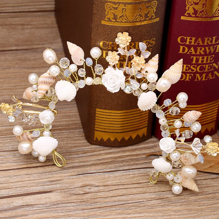 The bride jewelry European starfish pearl hairbands conch shells marriage yarn studio crown headdress wedding hair accessories
The bride jewelry European starfish pearl hairbands conch shells marriage yarn studio crown headdress wedding hair accessories