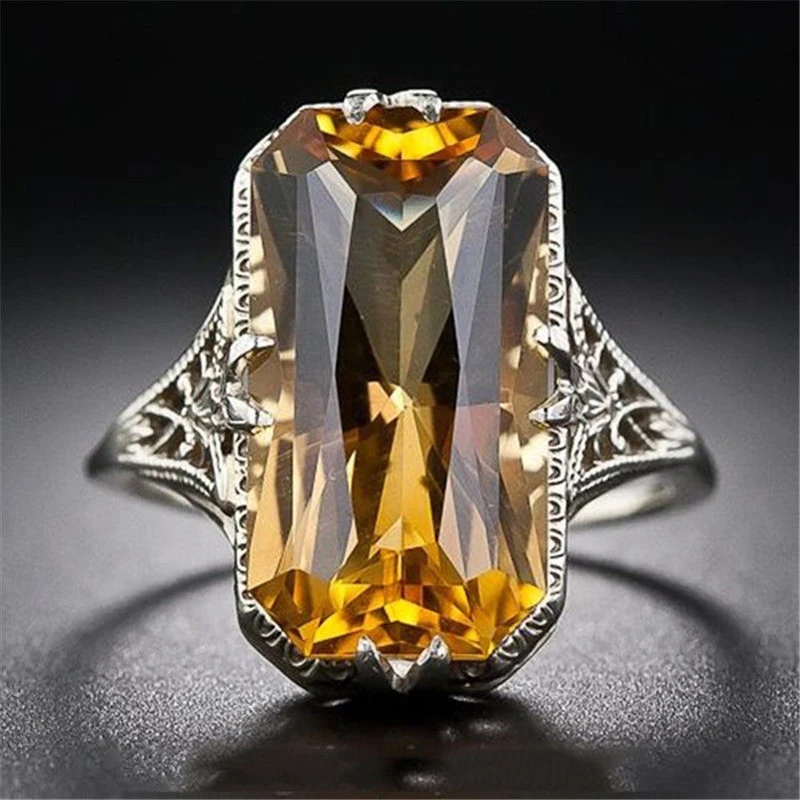 Hot Exaggerated Yellow Crystal Zircon Women Rings Silver Color Hollow Finger Rings Jewelry Wholesale anel feminino Size 6-10
Hot Exaggerated Yellow Crystal Zircon Women Rings Silver Color Hollow Finger Rings Jewelry Wholesale anel feminino Size 6-10