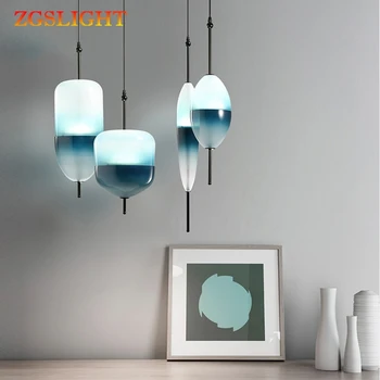 Modern teardrop-shaped blue glass Nordic pendant light LED art deco simple white hanging lamp for living room restaurant kitchen
Modern teardrop-shaped blue glass Nordic pendant light LED art deco simple white hanging lamp for living room restaurant kitchen