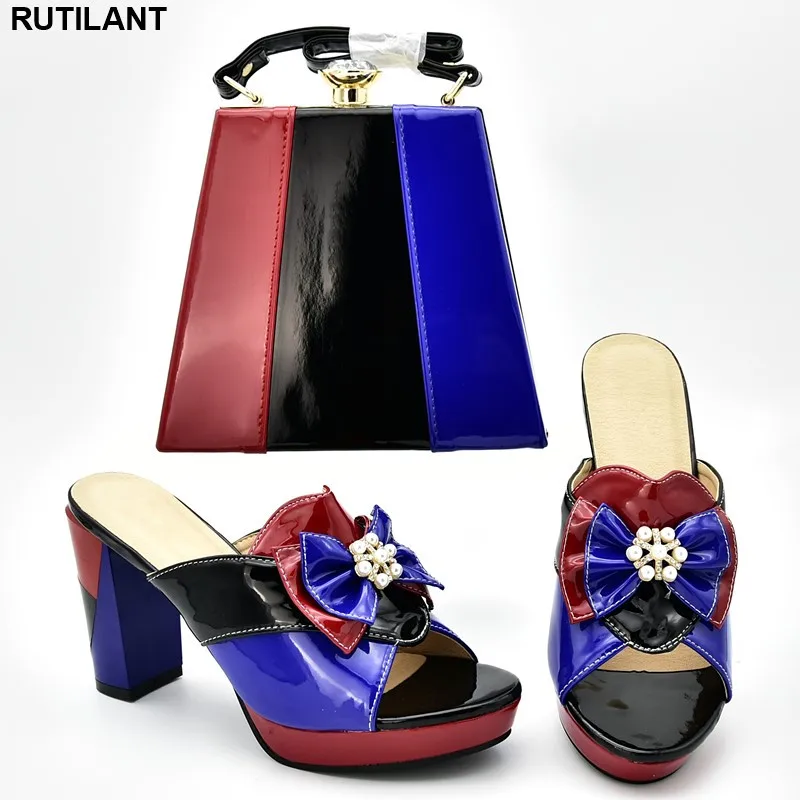 New Arrival African Matching Shoes and Bags Italian In Women Nigerian Women Party Shoes and Bag Set Decorated with Appliques
New Arrival African Matching Shoes and Bags Italian In Women Nigerian Women Party Shoes and Bag Set Decorated with Appliques