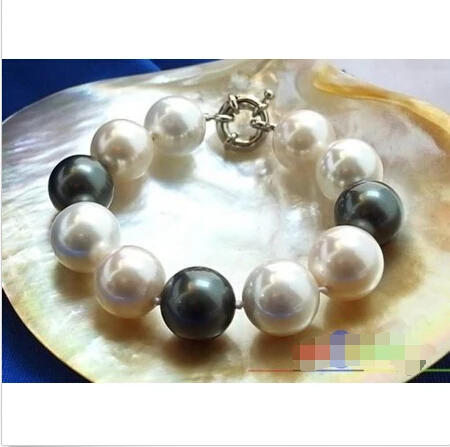 P1027 HUGE 8" 16MM WHITE BLACK ROUND SHELL PEARL BRACELET@^Noble style Natural Fine jewe FREE SHIPPING
P1027 HUGE 8" 16MM WHITE BLACK ROUND SHELL PEARL BRACELET@^Noble style Natural Fine jewe FREE SHIPPING