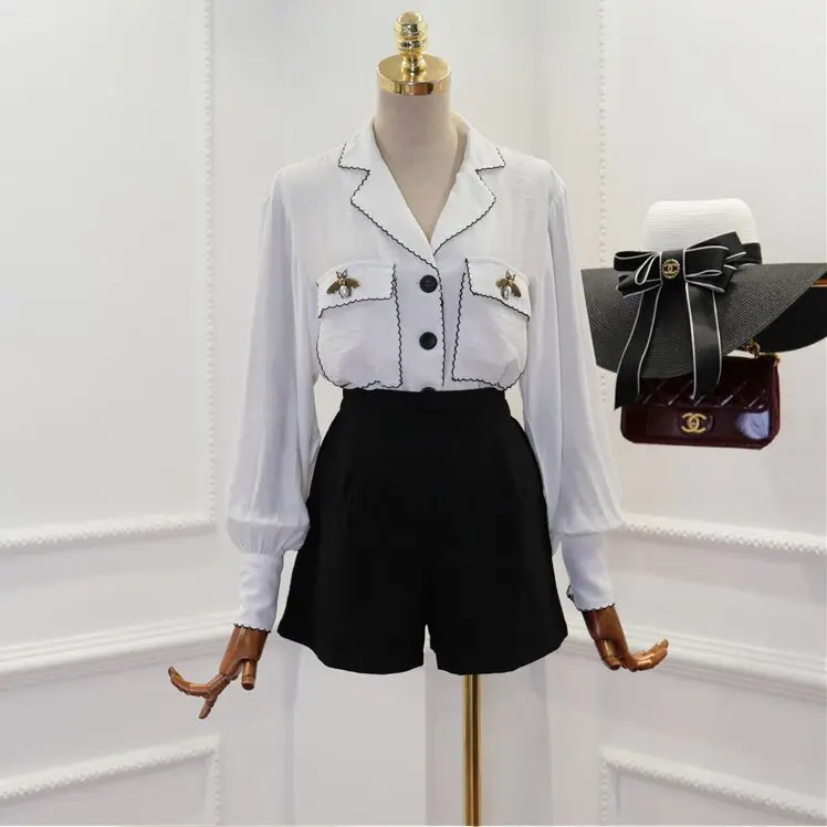 2018 Autumn New Fashion Women Suit Collar Pockets Lantern Sleeve Single Breasted Shirt + Elastic Waist Black Shorts 2 Piece Sets
2018 Autumn New Fashion Women Suit Collar Pockets Lantern Sleeve Single Breasted Shirt + Elastic Waist Black Shorts 2 Piece Sets